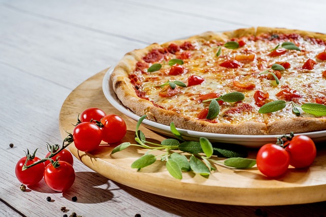 Biting into Domino’s Gluten-Free Pizza